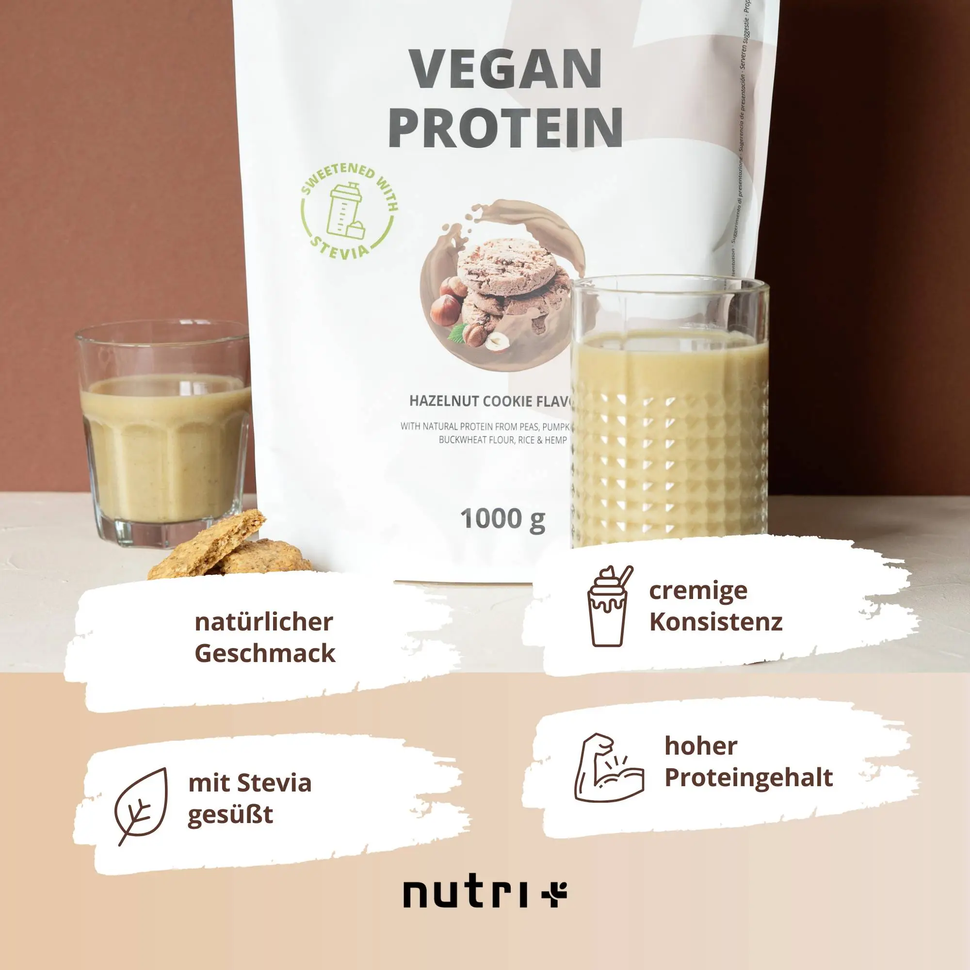 Verpackung des Vegan High 5 Protein Hazelnut Cookie mit Gläsern und Keksen, natürliche Zutaten und hoher Proteingehalt.