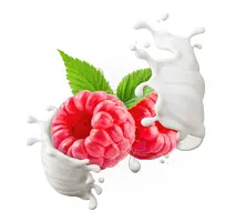 Frische Himbeeren mit Milchspritzern und grünen Blättern, die für einen fruchtigen Genuss stehen.