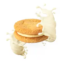 Leckere Keks-Sandwich mit Vanillecreme und spritzender Milch umgeben.